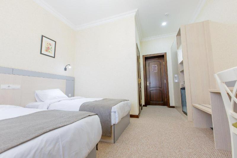 Navruz Hotel Tashkent Phòng bức ảnh